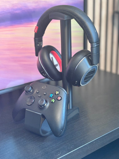 High-quality gaming setup stand holding a controller and headset against a stylish background.