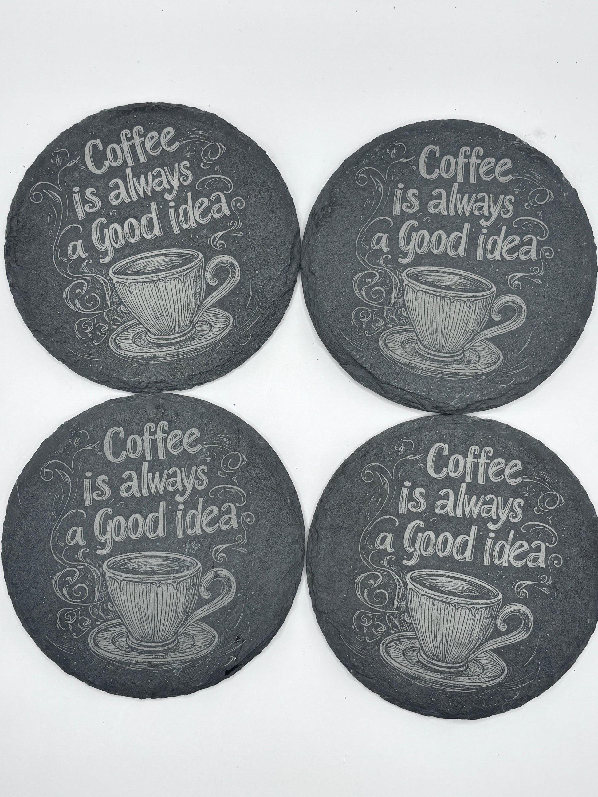 Underlägg i skiffer 4-pack – stilrena skydd för bord
