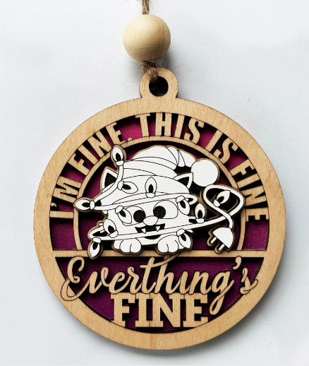 Humorous wooden Christmas ornament with a cat illustration saying "I'm Fine, This is Fine, Everything's Fine" for holiday decor.